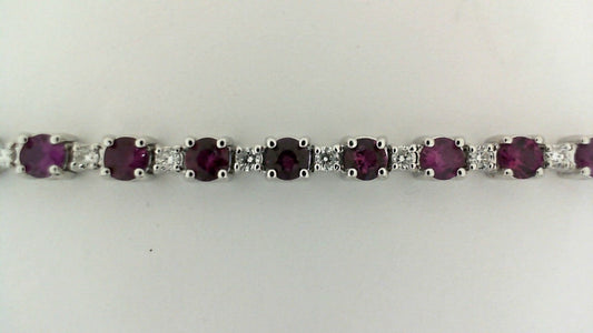 Color Gemstone Bracelet in 14 Karat White with 32 Round Rubies 3.71ctw