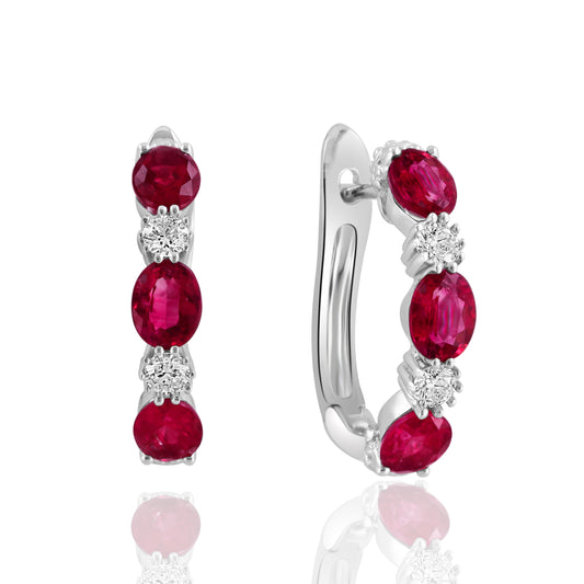 14K white gold hoop earrings, rubies, diamonds.