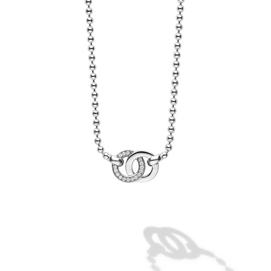 Interlocking diamond circles on silver chain necklace.