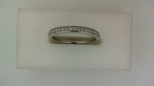 14K white gold band with round diamonds.