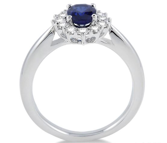 Oval blue sapphire ring with diamond halo.