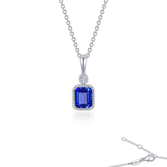Emerald-cut blue gemstone pendant necklace.