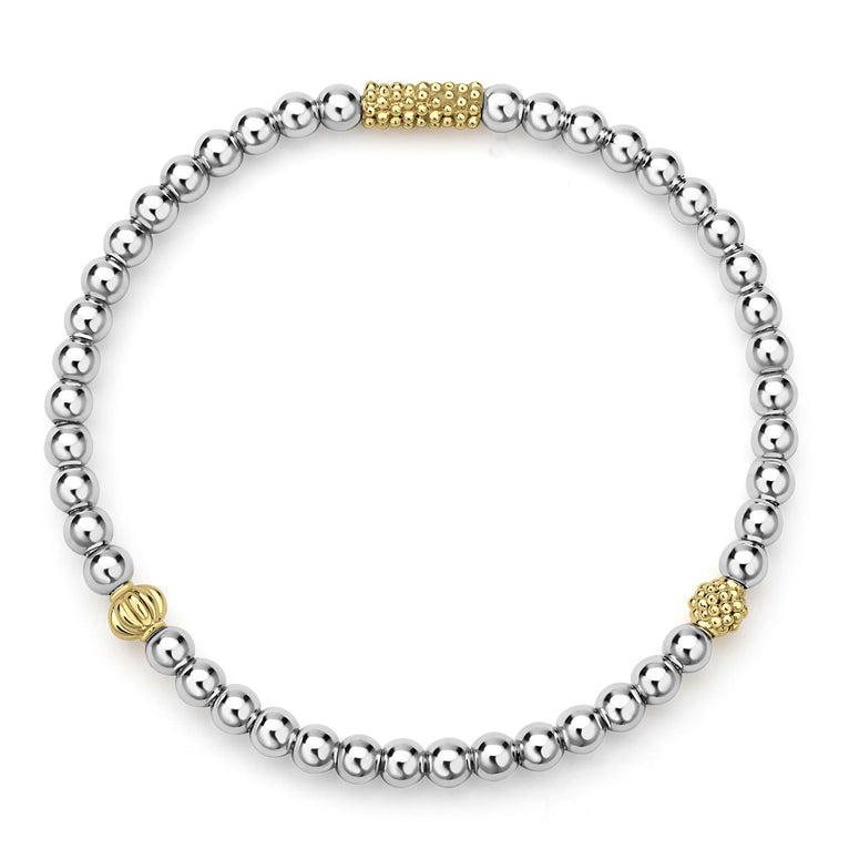 Sterling silver bracelet with gold accents.
