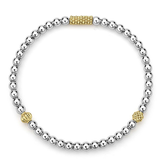 Sterling silver bracelet with gold accents.