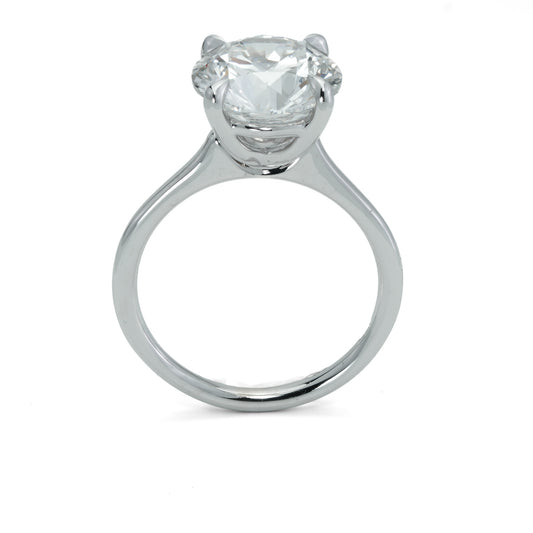 Solitaire lab-grown diamond engagement ring.