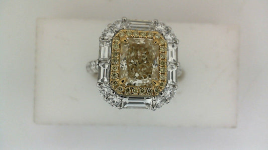 Radiant diamond halo ring, white-yellow gold.