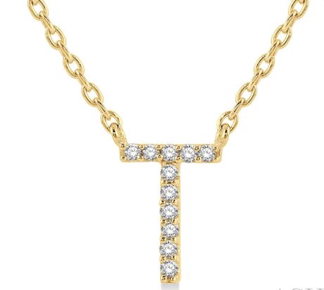 Yellow gold initial necklace with round diamonds.
