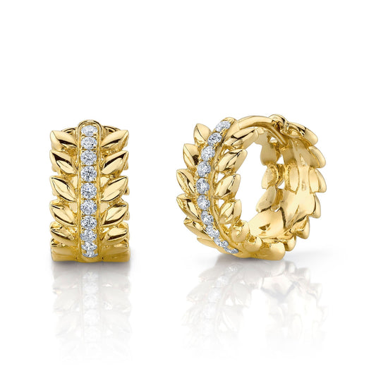 Gold leaf-patterned earrings with diamond accents.