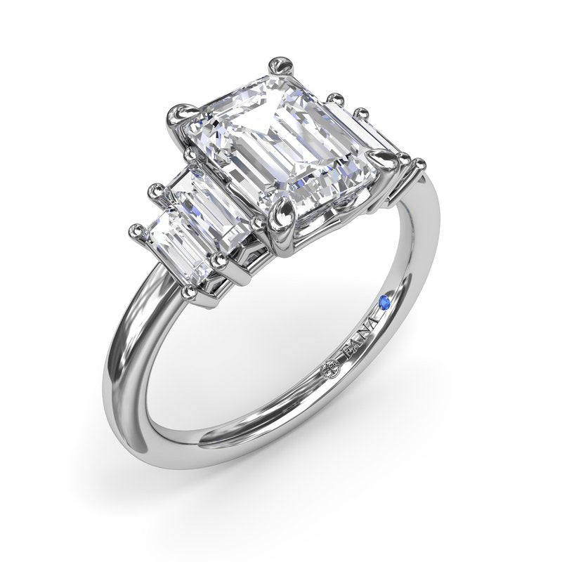 14K white gold ring with emerald diamonds.
