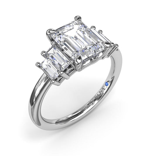 14K white gold ring with emerald diamonds.