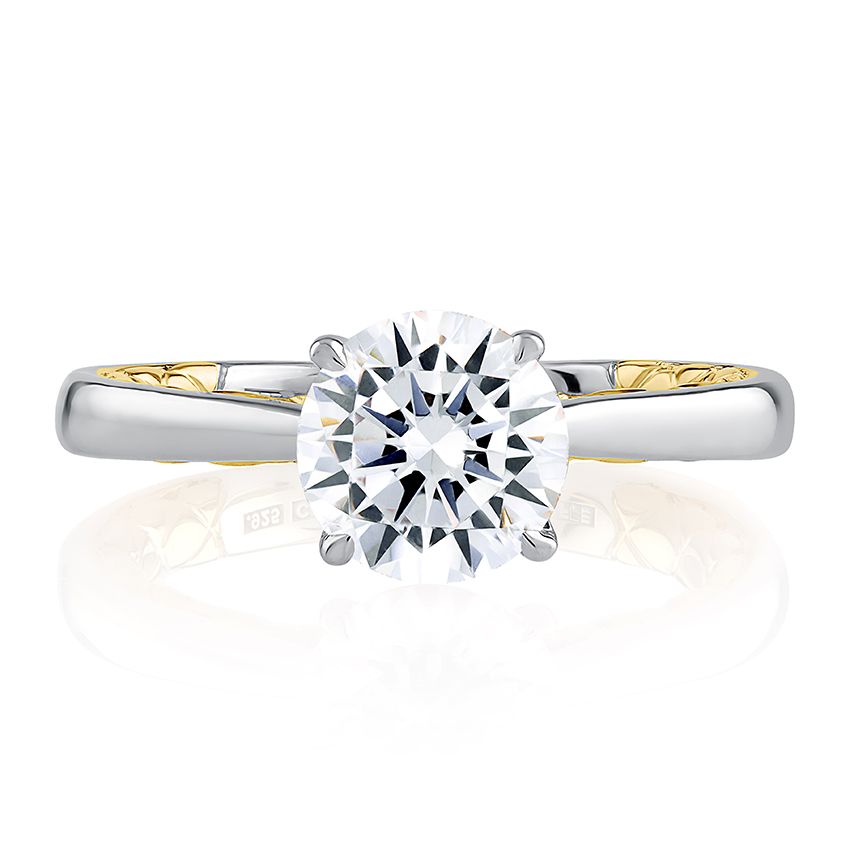 White yellow gold diamond engagement ring.