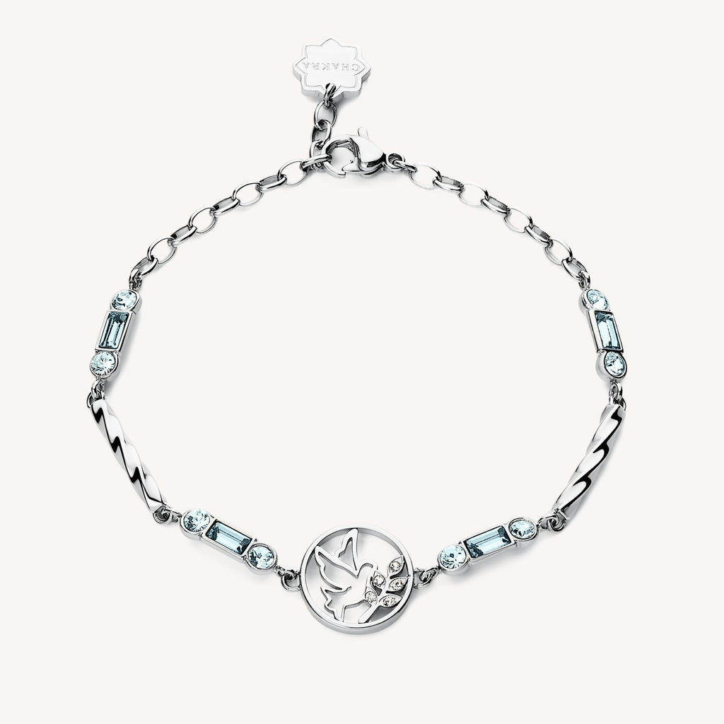 Stainless steel bracelet with blue gemstones.