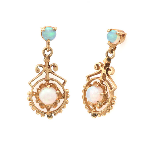 Opal cabochon dangle earrings, yellow gold filigree.