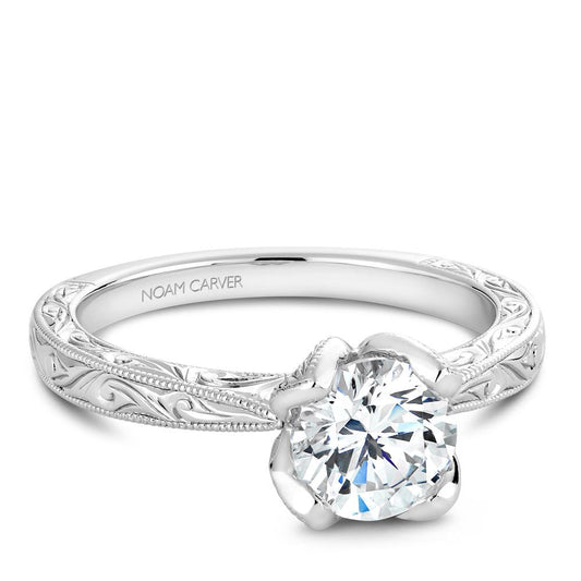 White gold solitaire engagement ring.