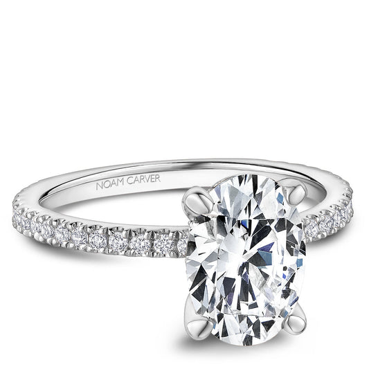 White gold ring with round diamond accents.
