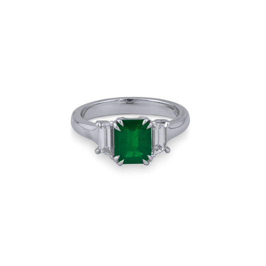 Emerald ring with trapezoid diamonds, white gold.