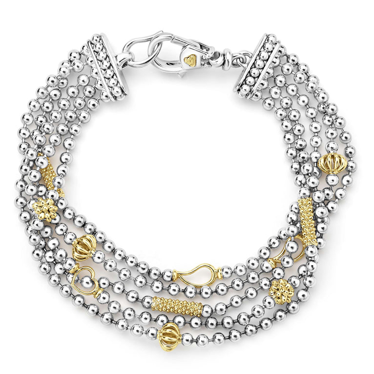 Sterling silver bracelet with gold accents.