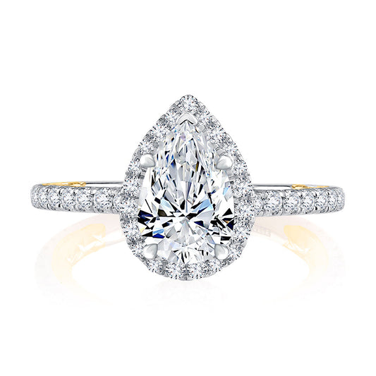 Pear-shaped diamond halo engagement ring.