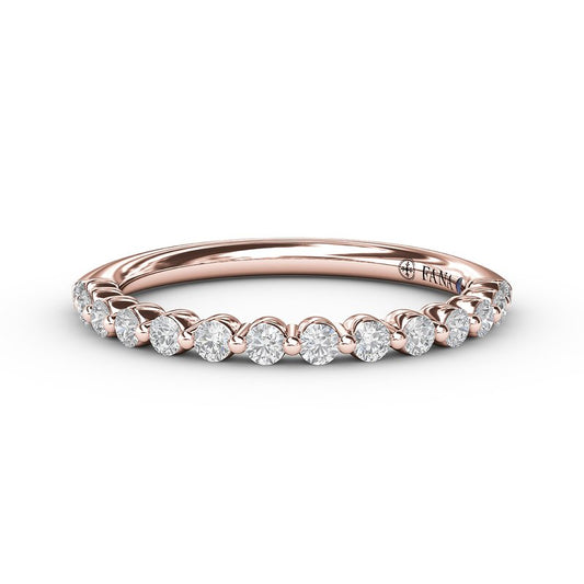 Rose gold band with round diamonds.