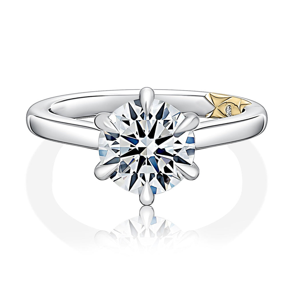 14K white gold ring with round diamond.
