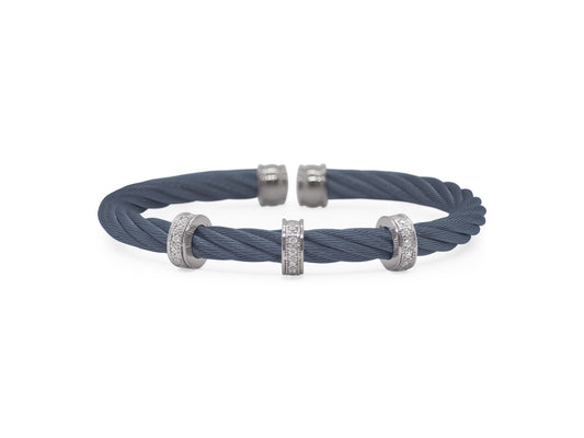 Blue cable bracelet with diamond accents.