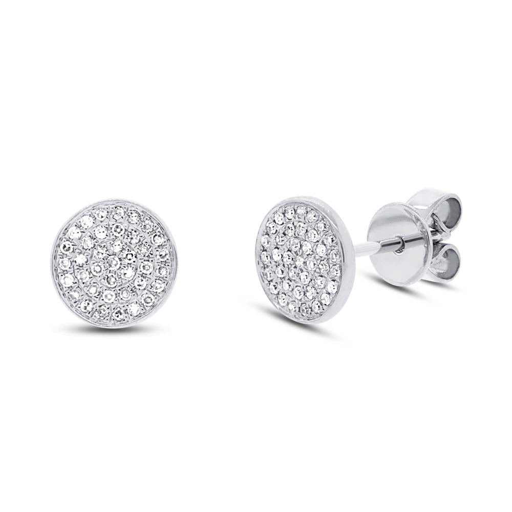 Round pave diamond earrings in white gold.