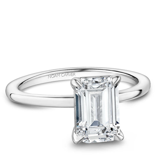 14K white gold solitaire engagement ring.