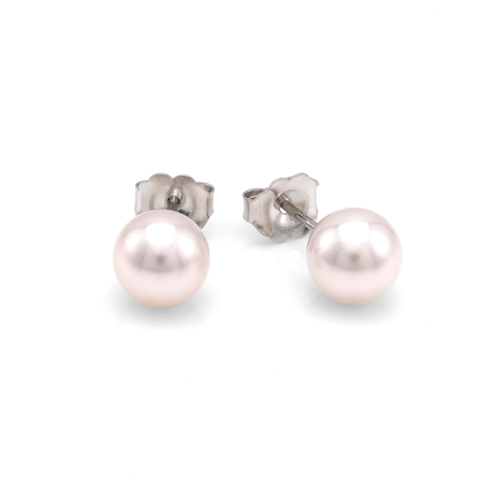 Cultured pearl earrings in white gold.