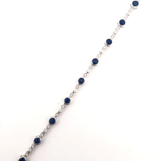 Color Gemstone Bracelet in 14 Karat White with 14 Round Sapphires 3.22ctw