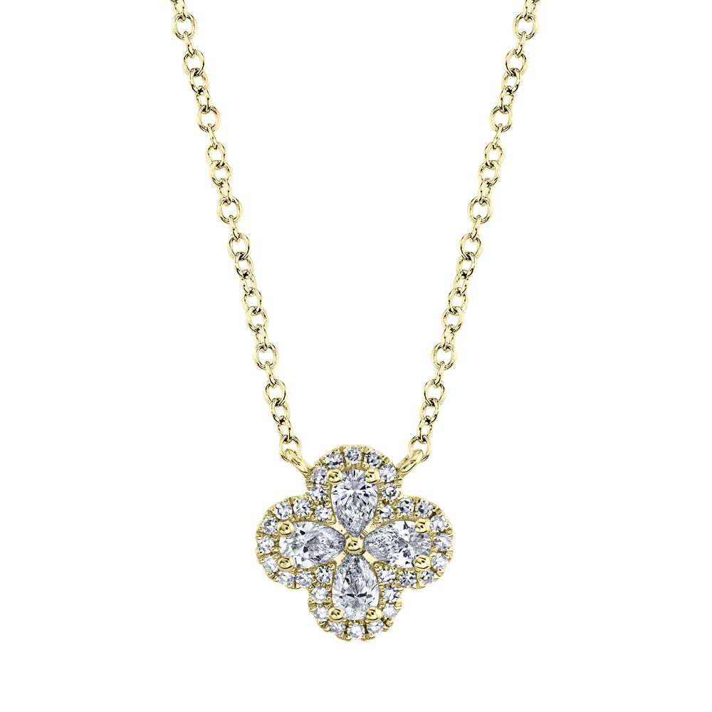 Clover-shaped diamond necklace in yellow gold.