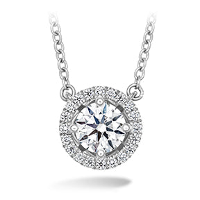 Round diamond necklace in white gold setting.