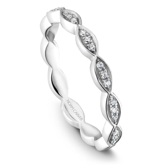 Diamond wedding band with marquise-shaped design.