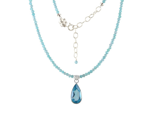 Blue gemstone drop necklace with bead chain.