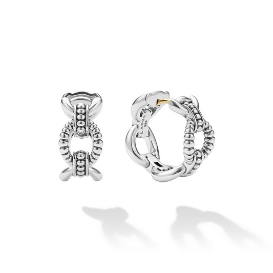 Sterling silver huggie earrings with caviar beading.