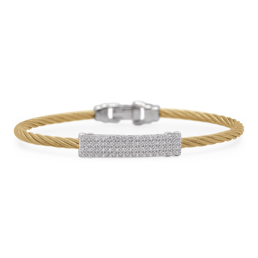 Yellow cable bracelet with diamond centerpiece.