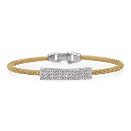 Yellow cable bracelet with diamond centerpiece.