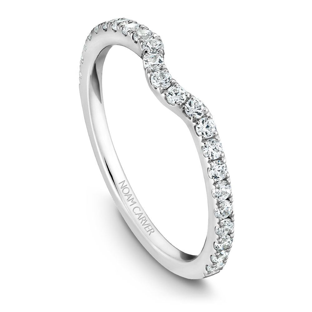 Rose gold band with round diamonds.