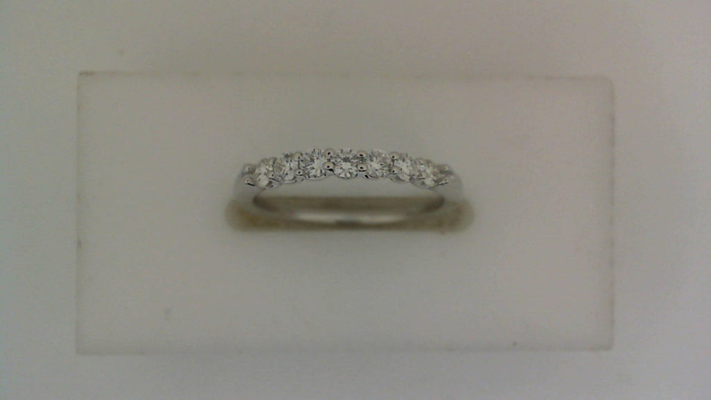 14K white gold band with natural diamonds.