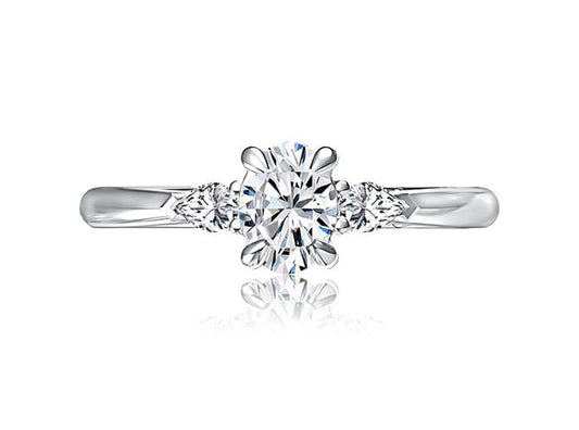 Three-stone diamond ring in white gold.