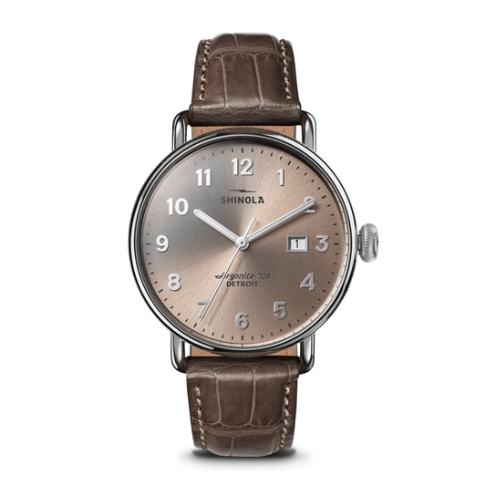 Champagne dial, stainless steel case, alligator band.