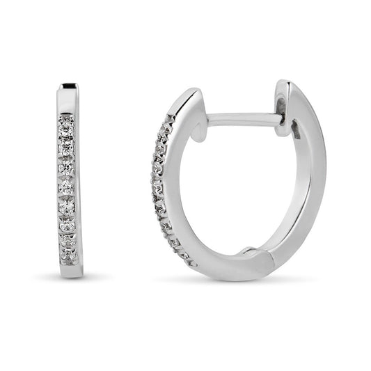 Small white gold hoop earrings with diamonds.