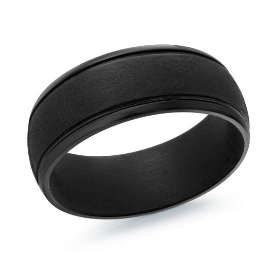 Black tantalum band with carved design.