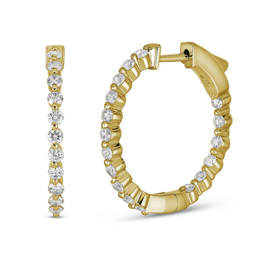 Small yellow gold hoop earrings with diamonds.