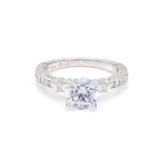 18K white gold diamond engagement ring.