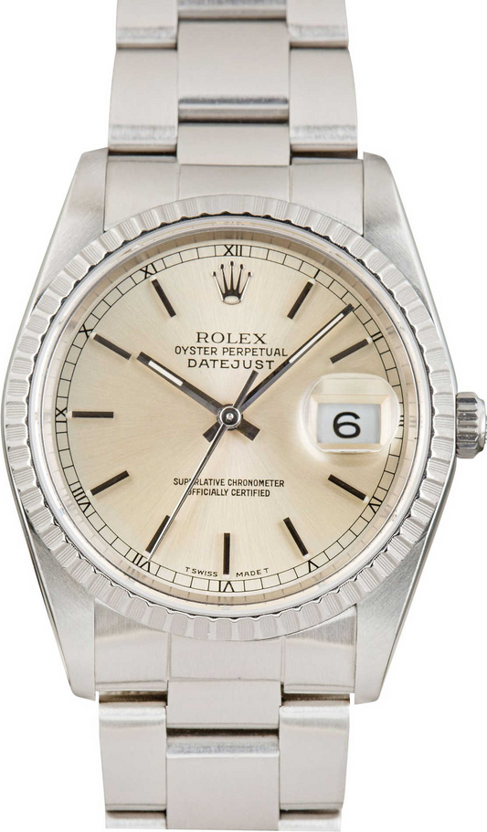 Silver Rolex Datejust watch with white gold bezel.