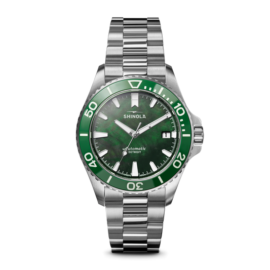 Green dial stainless steel automatic watch.