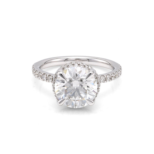 14K white gold ring with round diamonds.