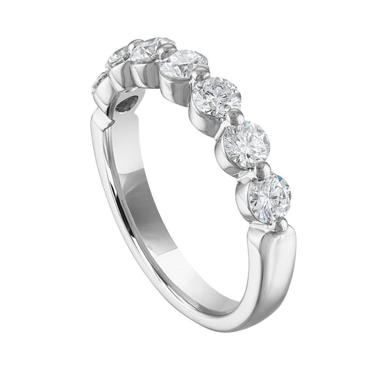 Seven-diamond white gold wedding band.