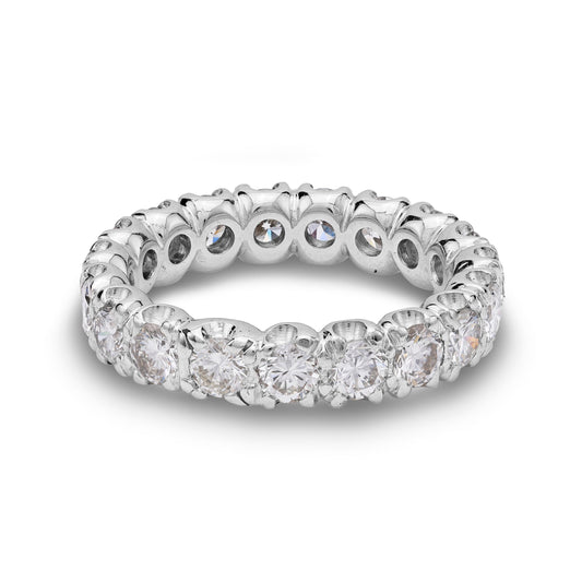 Platinum band with round diamonds, eternity design.
