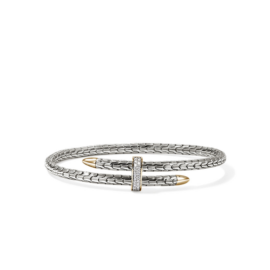 Sterling silver bangle with diamond accents.
